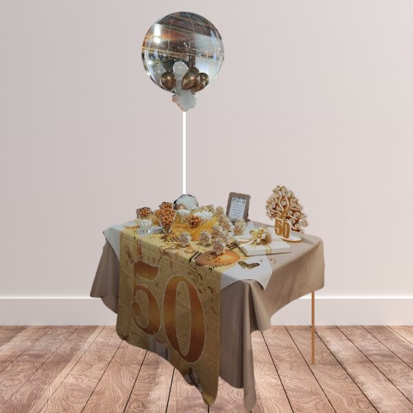 Allestimento tavolo confettata cinquantesimo anniversario
